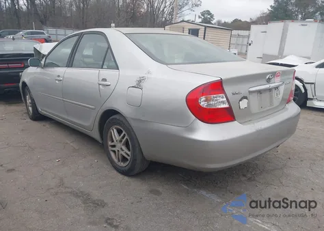 2002 Toyota Camry Le from USA, damaged, VIN JTDBE32K220080561